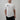 Man wearing white Faith definition t-shirt made from organic Supima cotton