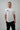 Man wearing white Faith definition t-shirt made from organic Supima cotton