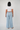 Back view of the YAHKARA Hudson Wide Leg Pants featuring a relaxed wide-leg fit, elastic waistband, and functional patch pockets in a lightweight denim-inspired fabric.