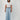 Woman wearing YAHKARA Hudson Wide Leg Pants in a light wash denim-inspired fabric featuring a relaxed wide-leg silhouette, elastic drawstring waistband, and oversized utility pockets.