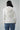 Luxury white blazer styled with denim for elevated everyday fashion