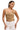 Woman wearing sand fringe top with open back and a pair of white jeans for a casual look.